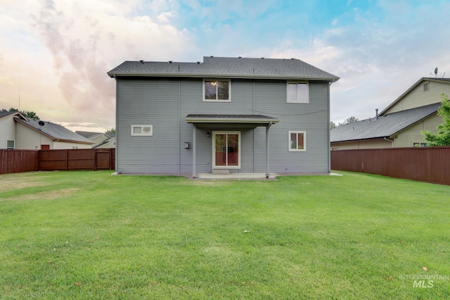 10224 W Altair, Star, ID 83669 - back of property with a patio and a fenced backyard