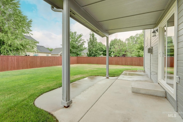 10224 W Altair, Star, ID 83669 - fenced backyard with a patio area