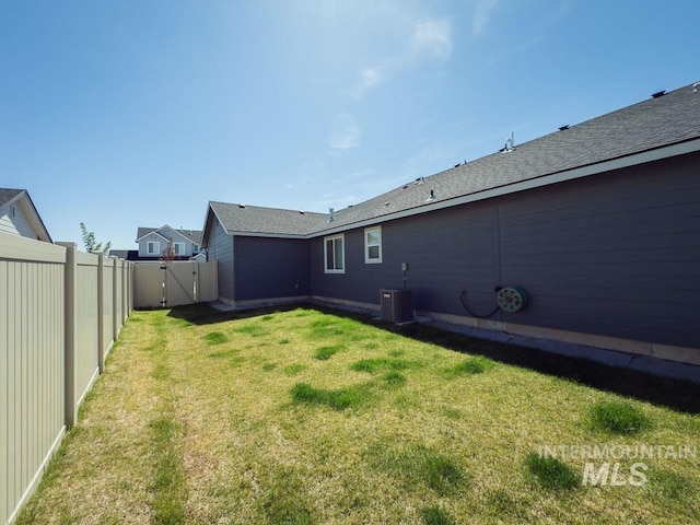 13743 S Sonata Way, Nampa, ID 83651 - view of yard featuring a gate and central air condition unit