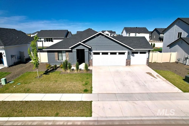 13743 S Sonata Way, Nampa, ID 83651 - craftsman inspired home with a garage, concrete driveway, and a residential view