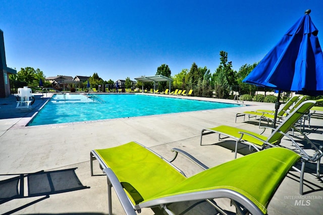 4672 N Patimos Ave, Meridian, ID 83646 - community pool with a patio