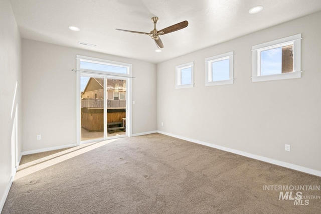 4672 N Patimos Ave, Meridian, ID 83646 - spare room with ceiling fan, carpet, baseboards, and recessed lighting