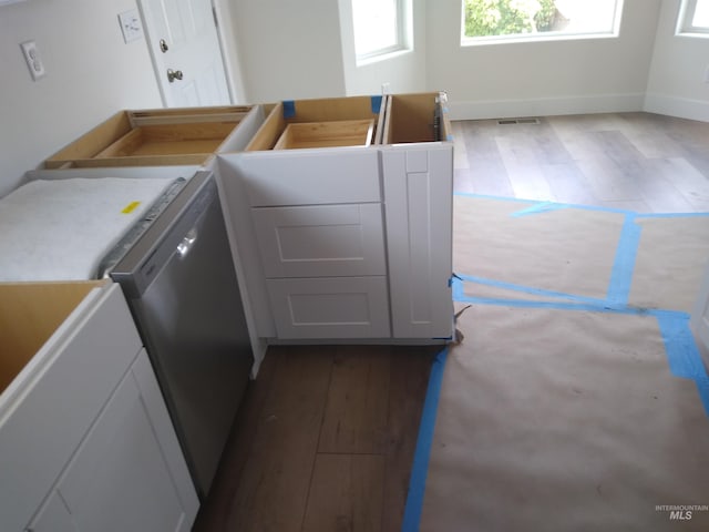 laundry room with light wood-type flooring