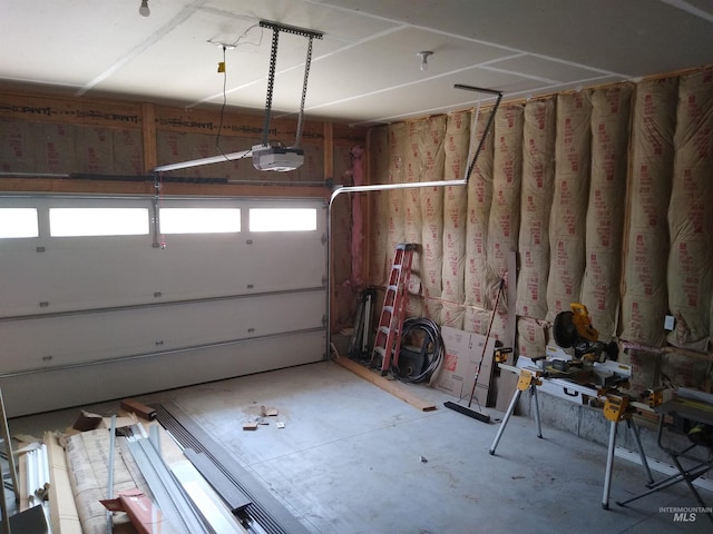 garage featuring a garage door opener