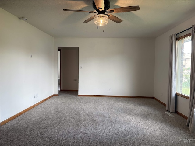 1715 S 10th Ave, Caldwell, ID 83605 - carpeted spare room with ceiling fan and a smoke detector