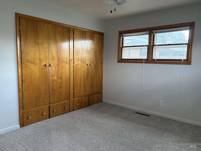 1715 S 10th Ave, Caldwell, ID 83605 - unfurnished bedroom featuring carpet floors and a closet