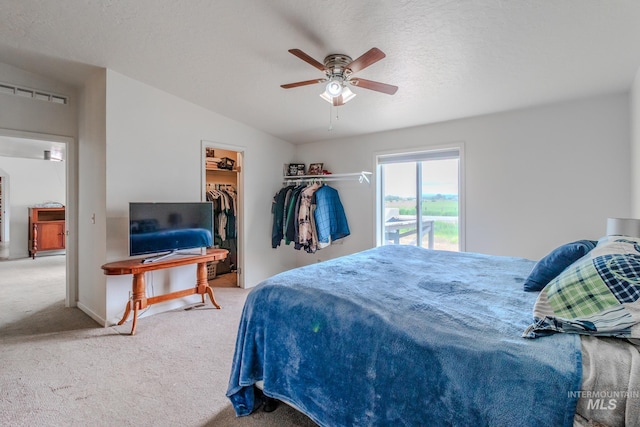 3537 Brogan Rd, Emmett, ID 83617 - bedroom featuring carpet flooring, a walk in closet, a ceiling fan, and a closet
