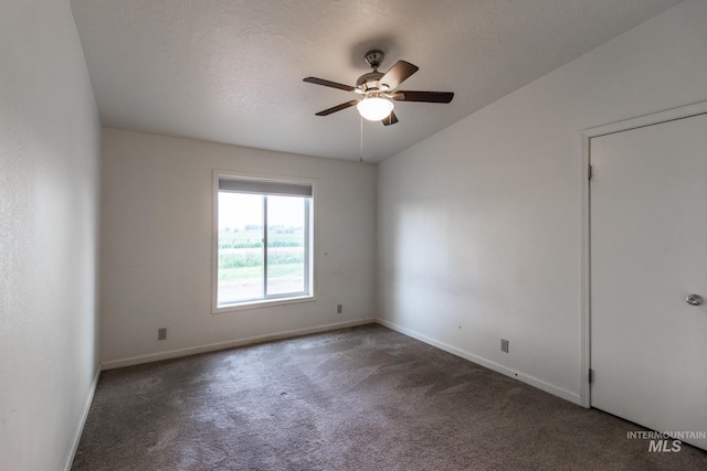 3537 Brogan Rd, Emmett, ID 83617 - empty room with carpet flooring, ceiling fan, baseboards, and lofted ceiling