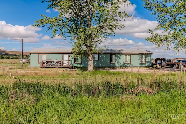 3537 Brogan Rd, Emmett, ID 83617 - rear view of property featuring a wooden deck