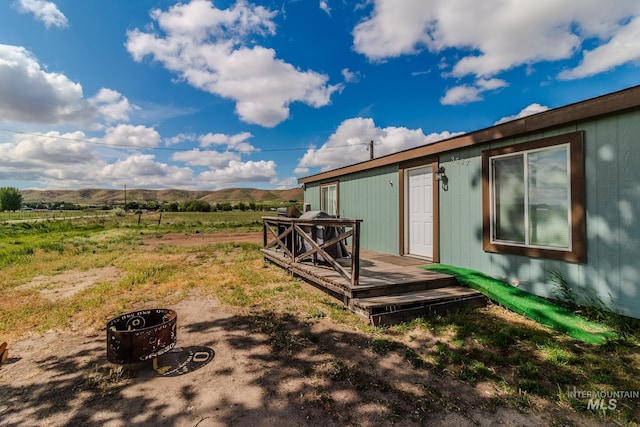 3537 Brogan Rd, Emmett, ID 83617 - view of yard with a deck with mountain view and a view of rural / pastoral area