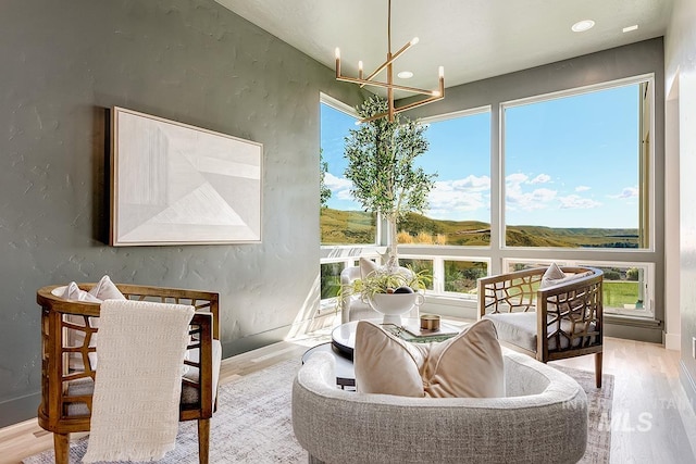 interior space with an inviting chandelier and a wealth of natural light