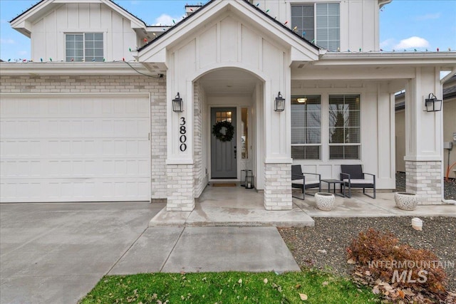 entrance to property featuring a garage