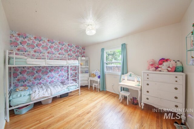 3509 8th St Unit C, Lewiston, ID 83501 - bedroom featuring wood finished floors and wallpapered walls