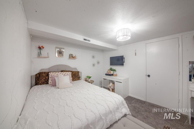 3509 8th St Unit C, Lewiston, ID 83501 - bedroom featuring carpet and a textured ceiling