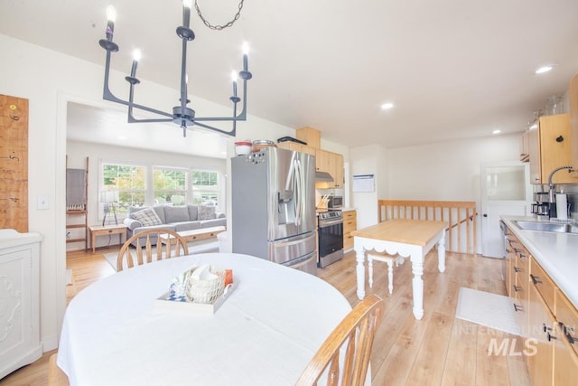 3509 8th St Unit C, Lewiston, ID 83501 - dining area featuring ceiling fan, light wood-type flooring, and recessed lighting