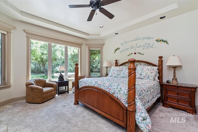 215 W Riverbridge Ln, Eagle, ID 83616 - carpeted bedroom featuring a tray ceiling, a ceiling fan, and recessed lighting