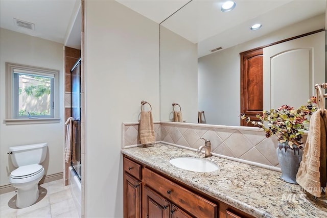 215 W Riverbridge Ln, Eagle, ID 83616 - full bathroom with vanity, backsplash, combined bath / shower with glass door, recessed lighting, and tile patterned floors