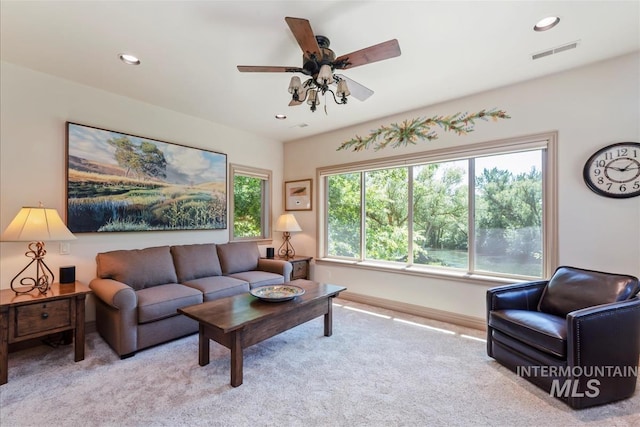 215 W Riverbridge Ln, Eagle, ID 83616 - carpeted living room with a ceiling fan and recessed lighting