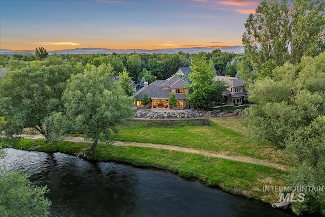 215 W Riverbridge Ln, Eagle, ID 83616 - aerial view at dusk of a water view