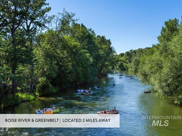 215 W Riverbridge Ln, Eagle, ID 83616 - water view featuring a heavily wooded area
