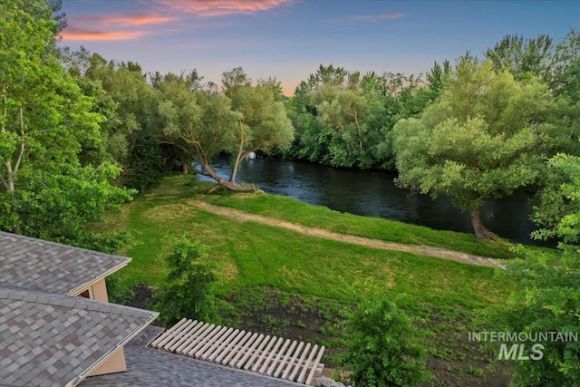 215 W Riverbridge Ln, Eagle, ID 83616 - view of grassy yard featuring a water view