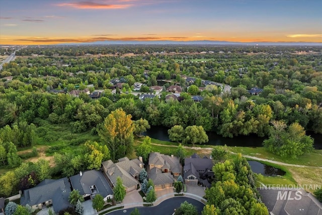 215 W Riverbridge Ln, Eagle, ID 83616 - aerial view of property's location with nearby suburban area and a nearby body of water