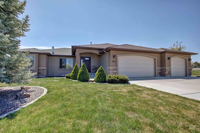 3623 E 3880 N, Kimberly, ID 83341 - ranch-style home featuring a garage, stone siding, and driveway