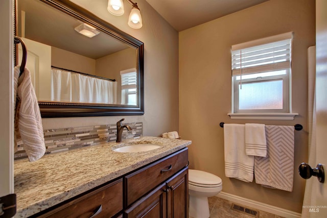3623 E 3880 N, Kimberly, ID 83341 - full bathroom with vanity, backsplash, and tile patterned floors