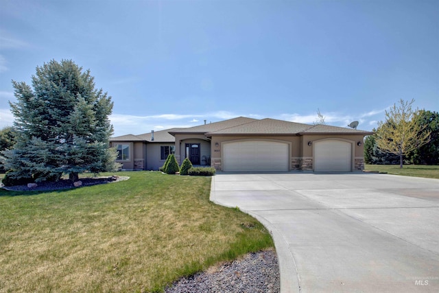 3623 E 3880 N, Kimberly, ID 83341 - ranch-style home featuring a garage, stone siding, concrete driveway, and a front yard