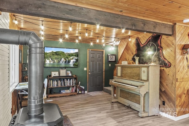 429 Doriann Dr, Cascade, ID 83611 - sitting room featuring wood finished floors, wooden walls, wood ceiling, and baseboards