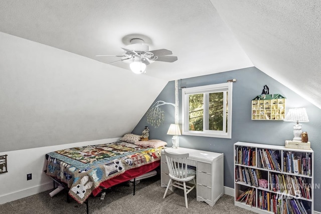 429 Doriann Dr, Cascade, ID 83611 - carpeted bedroom with lofted ceiling, a textured ceiling, baseboards, and a ceiling fan