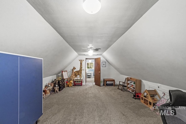 429 Doriann Dr, Cascade, ID 83611 - rec room featuring vaulted ceiling, carpet, and a ceiling fan