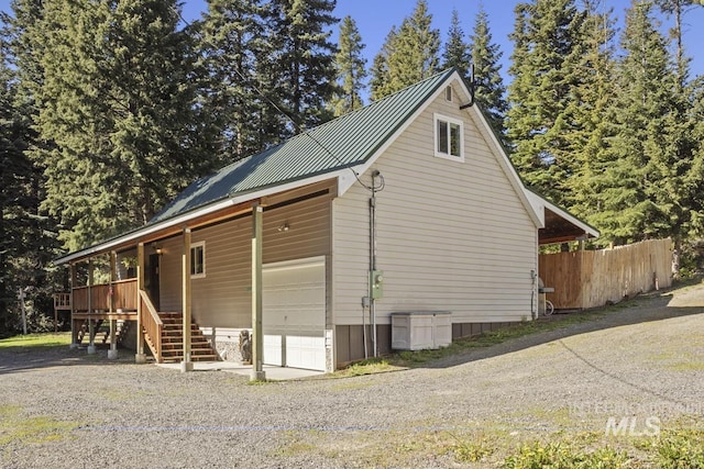 429 Doriann Dr, Cascade, ID 83611 - view of side of home with metal roof and stairway