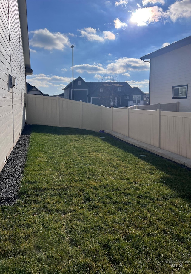 view of yard featuring a fenced backyard