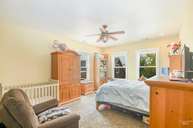 20169 Hoskins Rd, Caldwell, ID 83607 - bedroom with a ceiling fan, visible vents, and light colored carpet