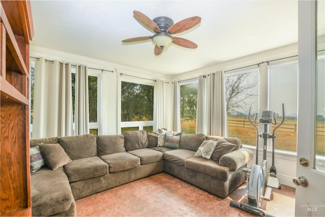 sunroom / solarium with ceiling fan