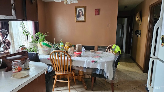 view of tiled dining area