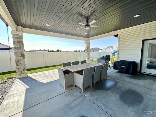 view of patio / terrace featuring ceiling fan and a grill