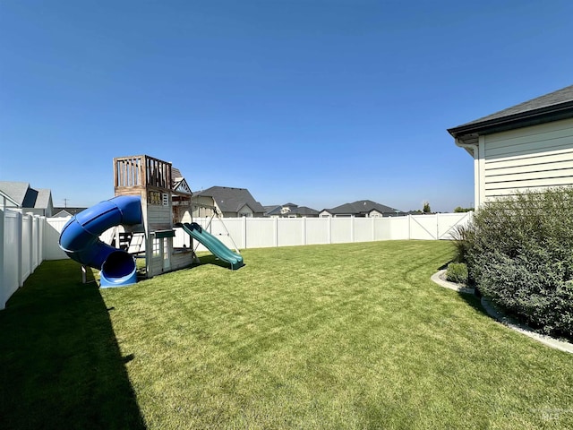 view of yard with a playground