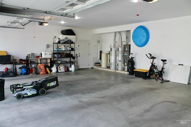 garage featuring a garage door opener and gas water heater