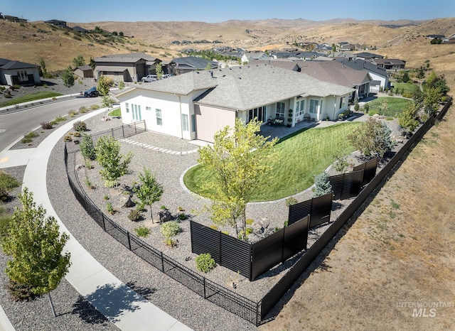 bird's eye view featuring a mountain view and a residential view