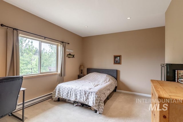 bedroom with baseboards, a baseboard radiator, recessed lighting, and light carpet