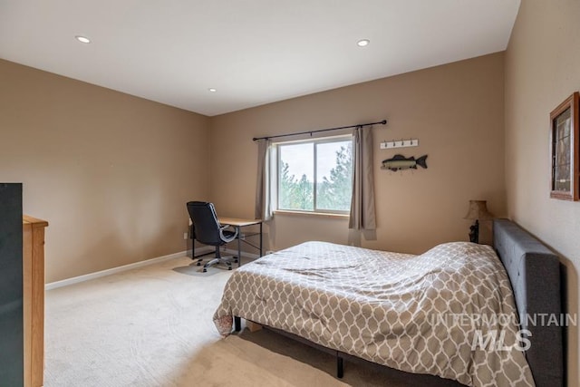 carpeted bedroom with baseboards and recessed lighting