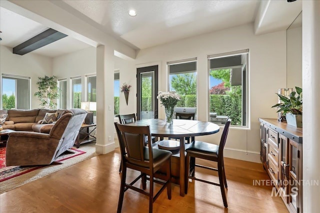 1480 N Colline Bello, Eagle, ID 83616 - dining room with healthy amount of natural light, light wood-type flooring, recessed lighting, and beamed ceiling