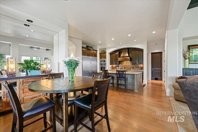 1480 N Colline Bello, Eagle, ID 83616 - dining area featuring light wood-style floors, ceiling fan, and recessed lighting