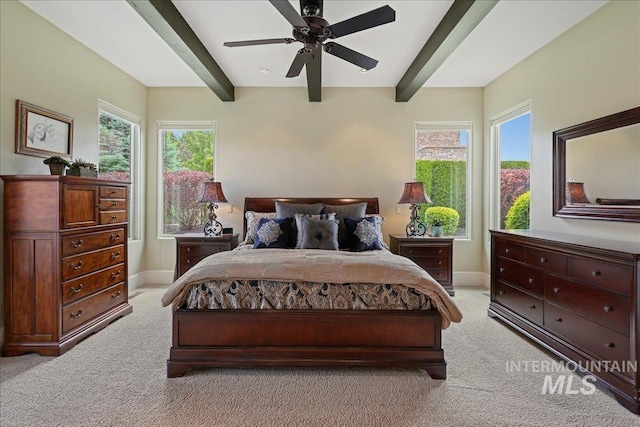 1480 N Colline Bello, Eagle, ID 83616 - bedroom featuring beam ceiling, light colored carpet, baseboards, and multiple windows