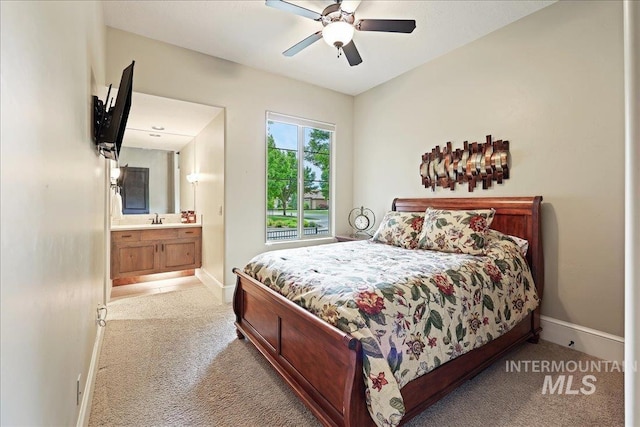 1480 N Colline Bello, Eagle, ID 83616 - bedroom with baseboards, light carpet, and a sink