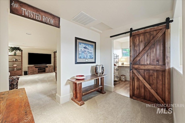 1480 N Colline Bello, Eagle, ID 83616 - corridor with carpet flooring, a barn door, and baseboards