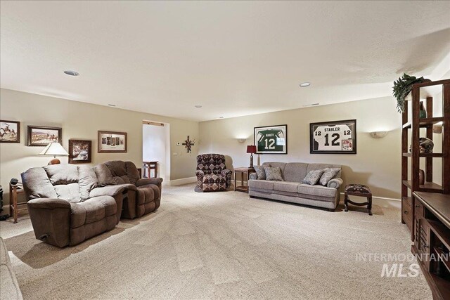 1480 N Colline Bello, Eagle, ID 83616 - carpeted living area with baseboards and recessed lighting