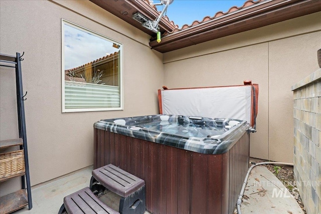 1480 N Colline Bello, Eagle, ID 83616 - view of patio / terrace with a hot tub